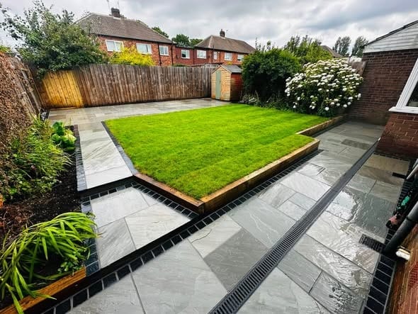 The finished patio and lawn from the house